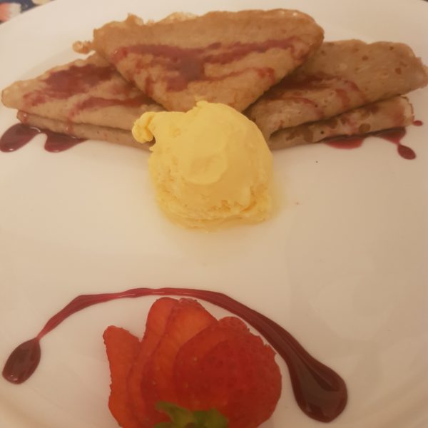 Pancakes with Strawberries, Vanilla, Ice Cream and Maple Syrup