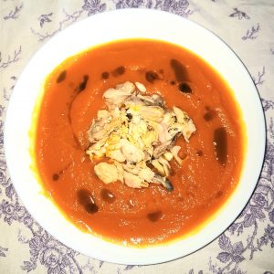 Spicy Pumpkin Soup with Poached Salmon and Sea Bass
